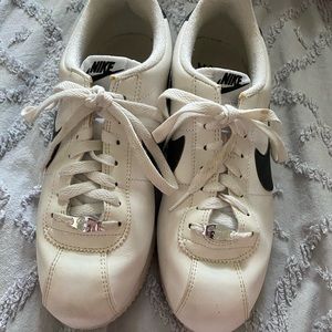 Womens Nike black and white cortez shoes